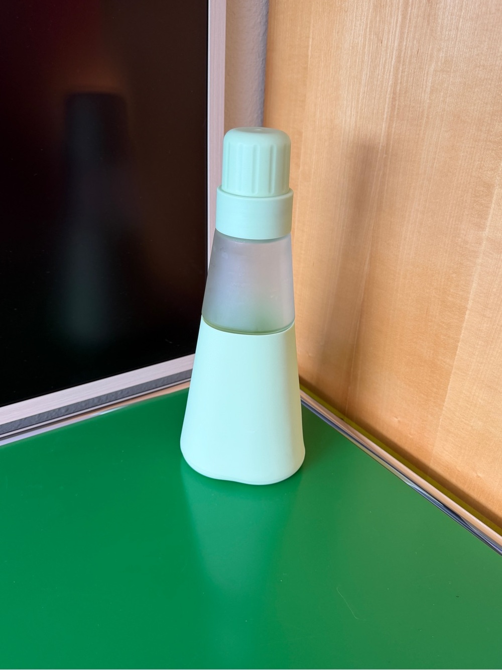 Clean cult mint green reusable glass laundry detergent bottle
